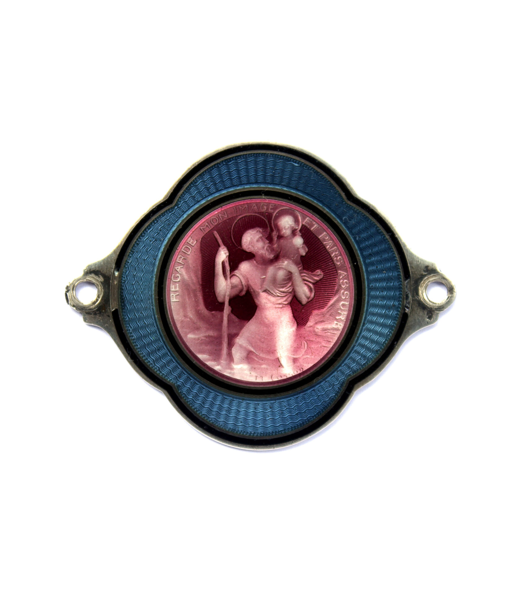 A fine silver and guilloche enamel Saint Christopher dashboard badge by Marius Cosson. Not common flower shaped. Measures 60mm x 50mm. Silver and enamel over guilloche with minor defects. Signed M.Cosson.